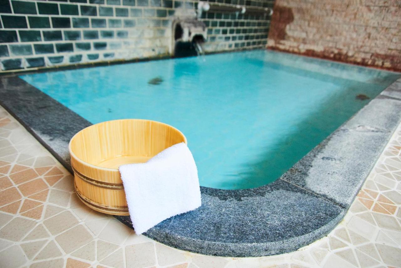 Tsukasaya Ryokan Tsuruoka Exteriör bild