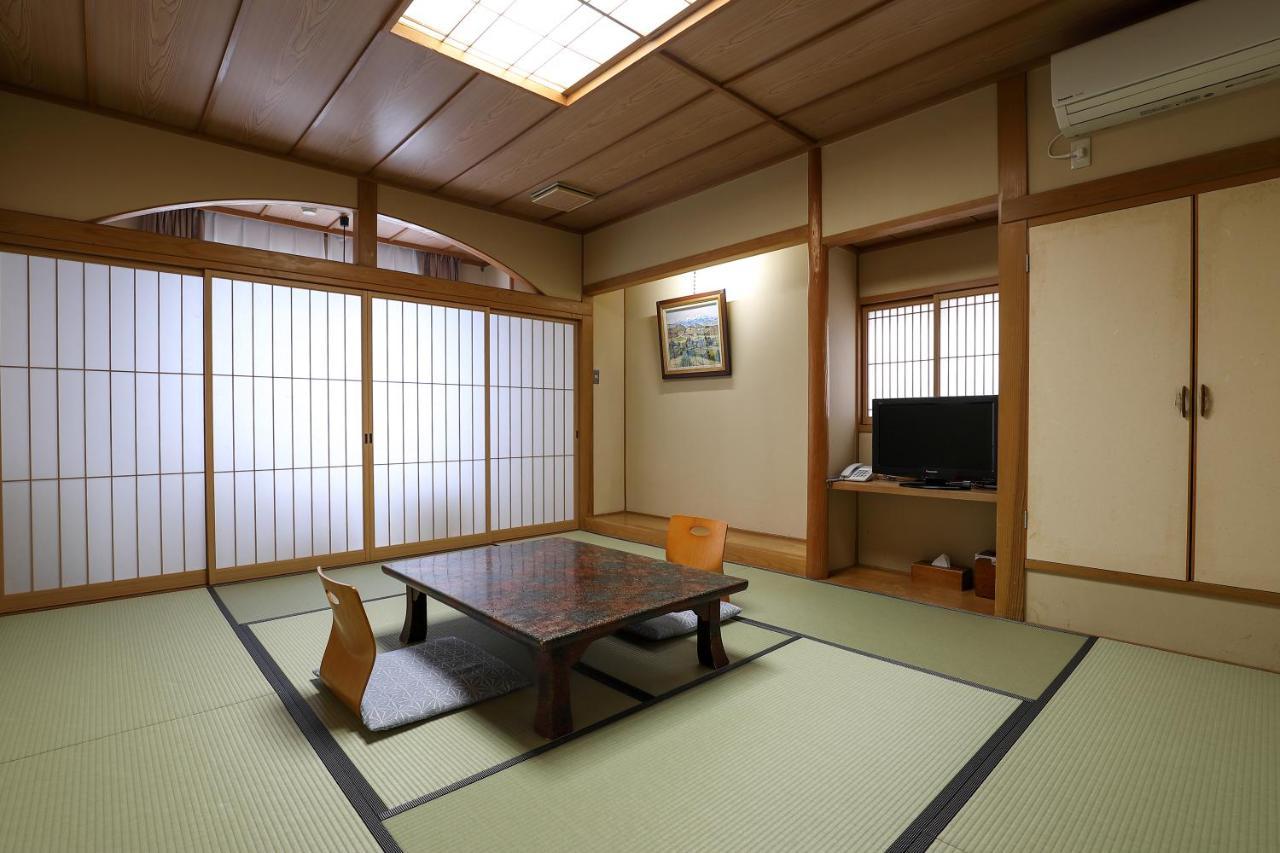 Tsukasaya Ryokan Tsuruoka Exteriör bild