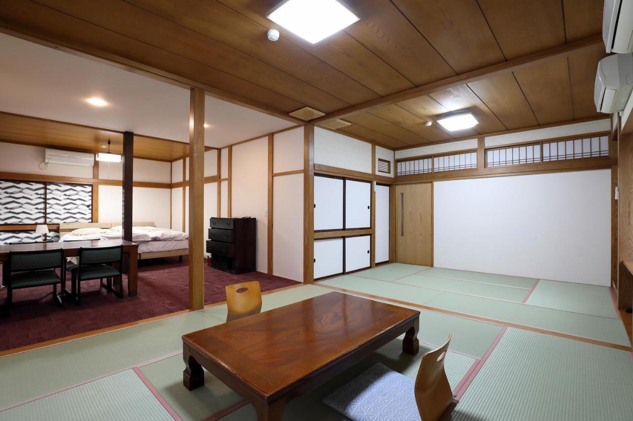 Tsukasaya Ryokan Tsuruoka Exteriör bild