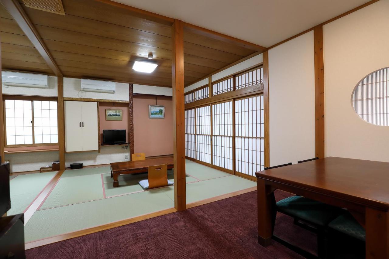 Tsukasaya Ryokan Tsuruoka Exteriör bild