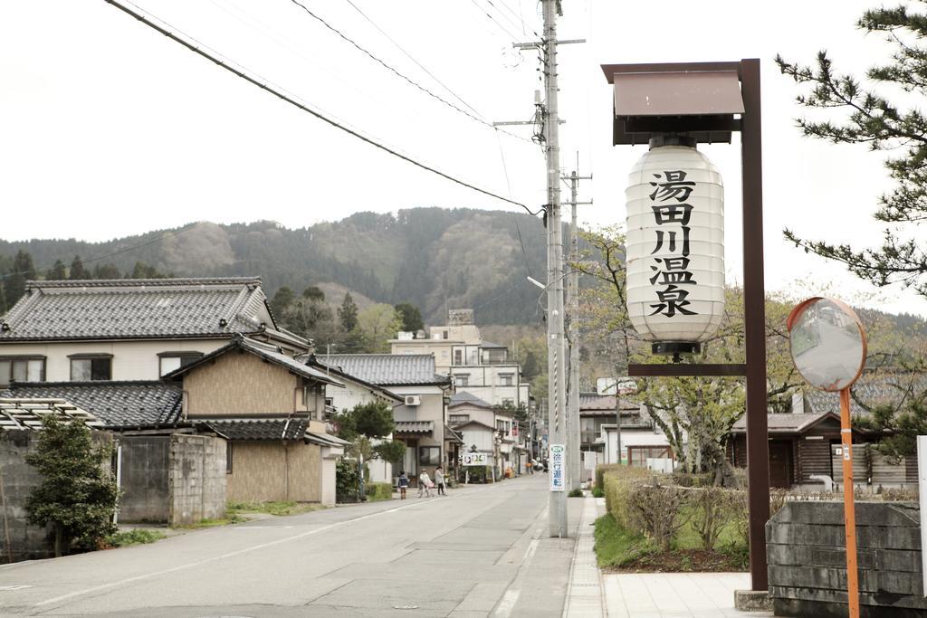 Tsukasaya Ryokan Tsuruoka Exteriör bild