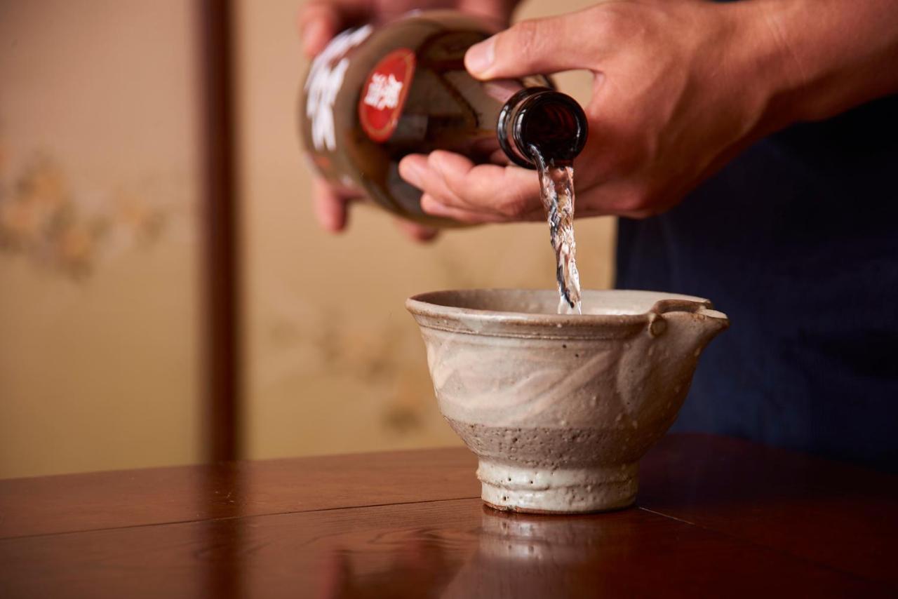 Tsukasaya Ryokan Tsuruoka Exteriör bild